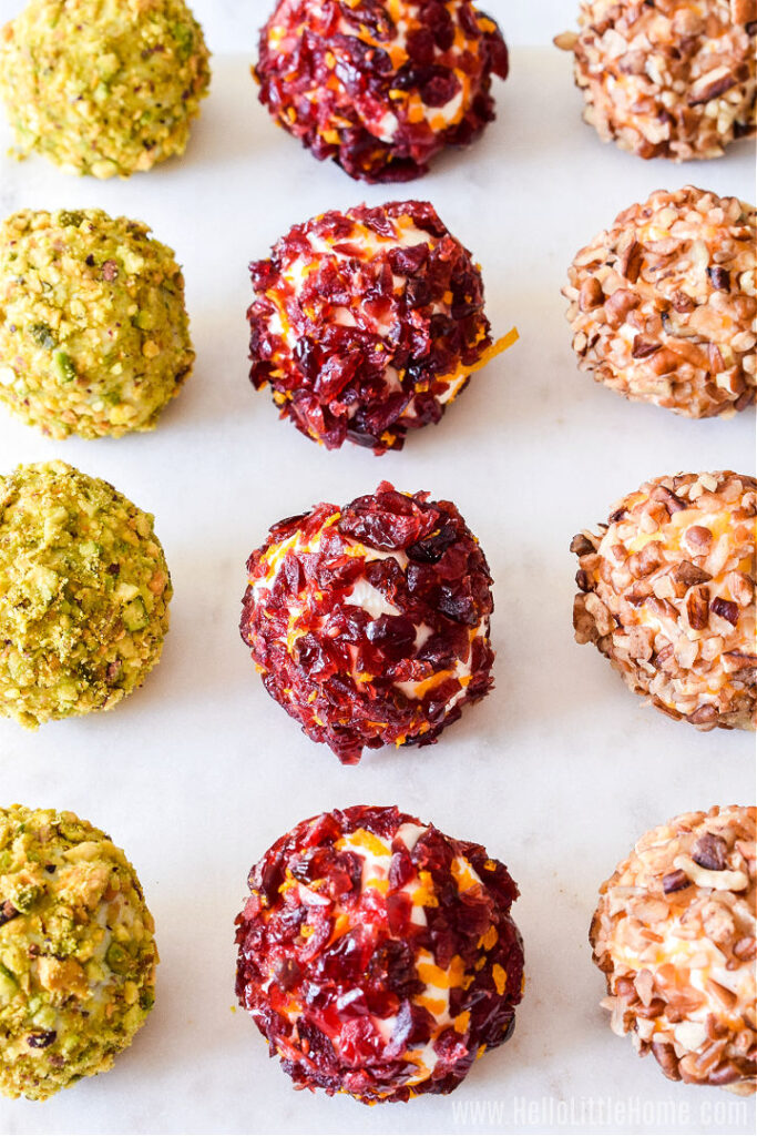 Check out these delicious and easy cheese ball recipes perfect for your next party or gathering. Simple easy party approved cheese balls. #passion4savings #cheeseballs #party #appetizer #cheese #fun #fingerfood #quick #holiday #foracrowd mini cheese truffles