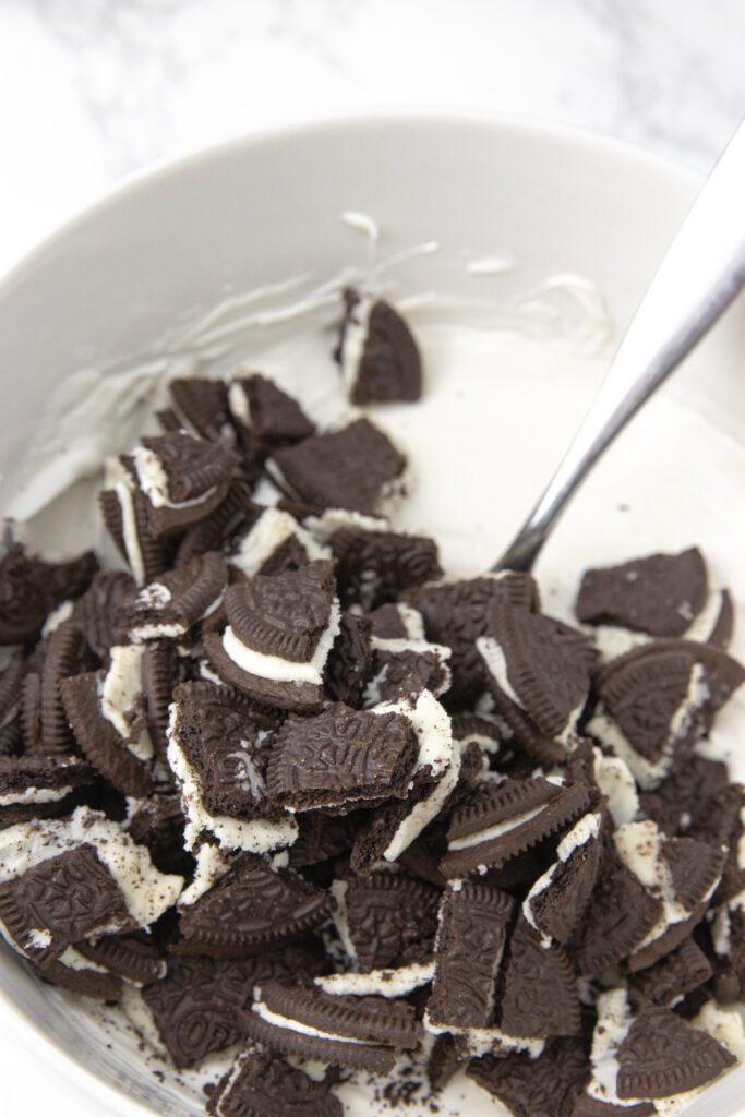 mixing oreos in with white chocolate 