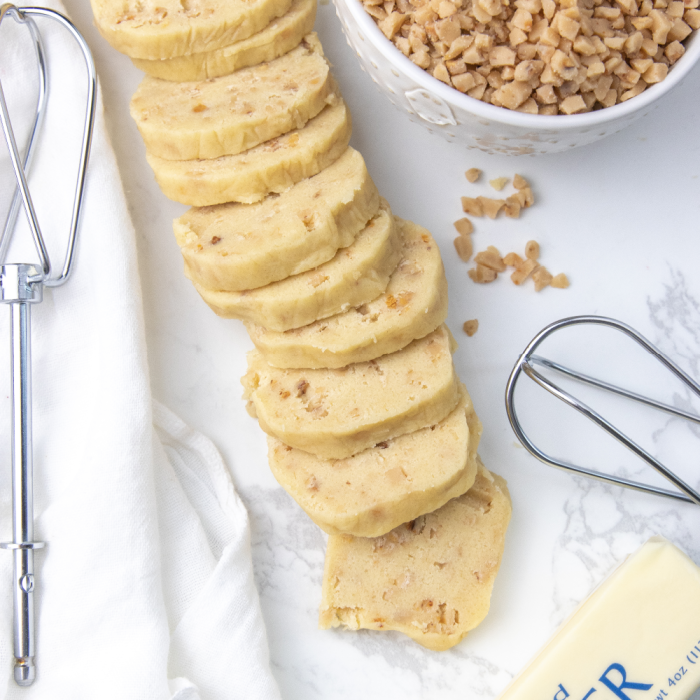 Sliced cookie dough on counter 