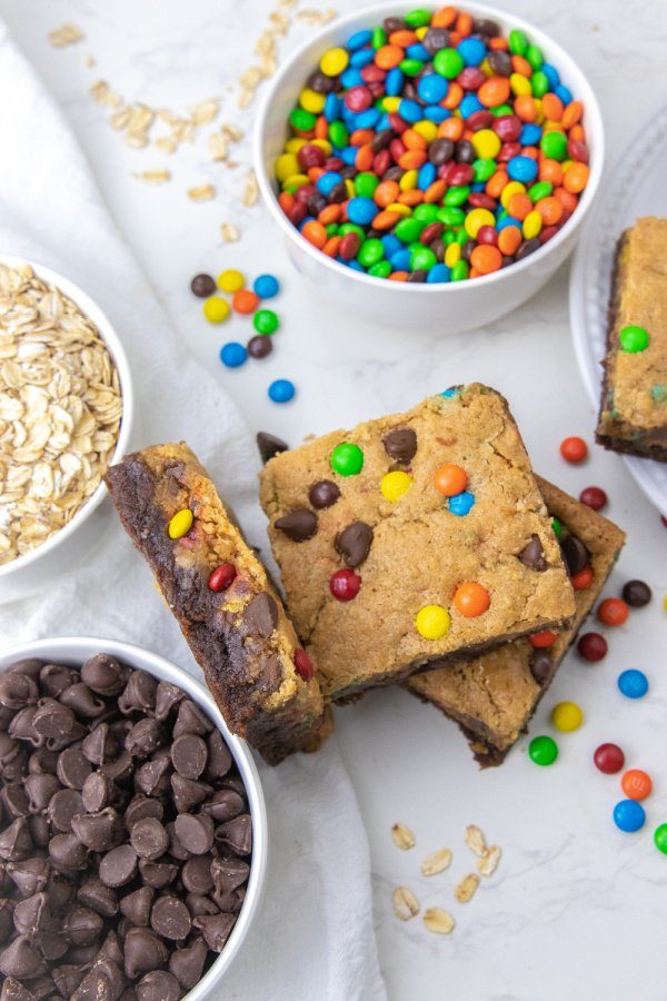 brownies on counter with oats m&Ms and stuff around it 
