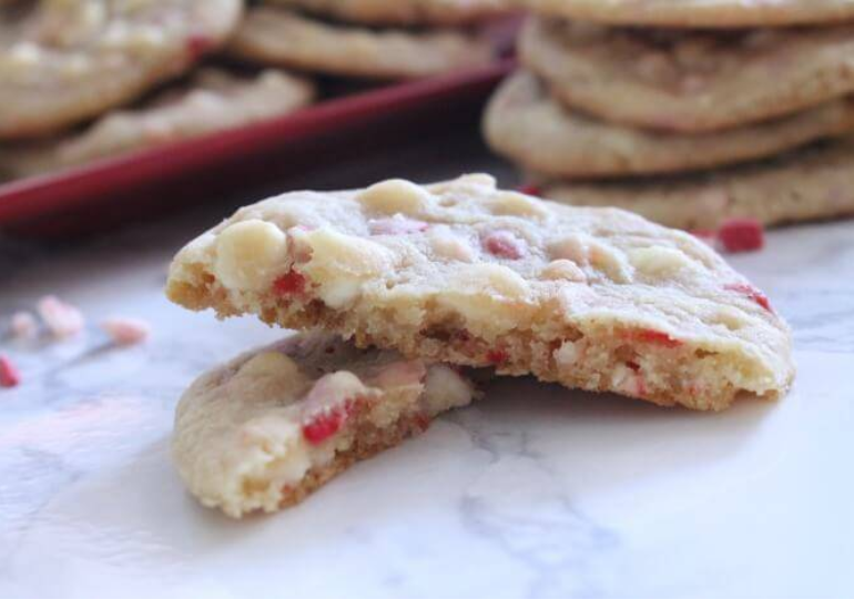 peppermint cookie broken in half on table