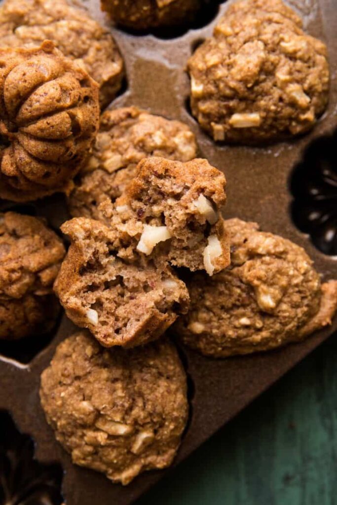 apple cakes on a baking muffin tin