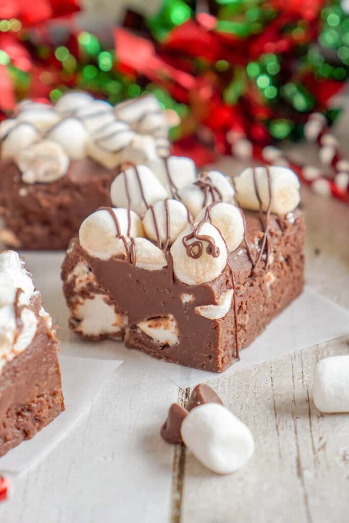 sliced fudge with marshmallows on top on wooden counter 