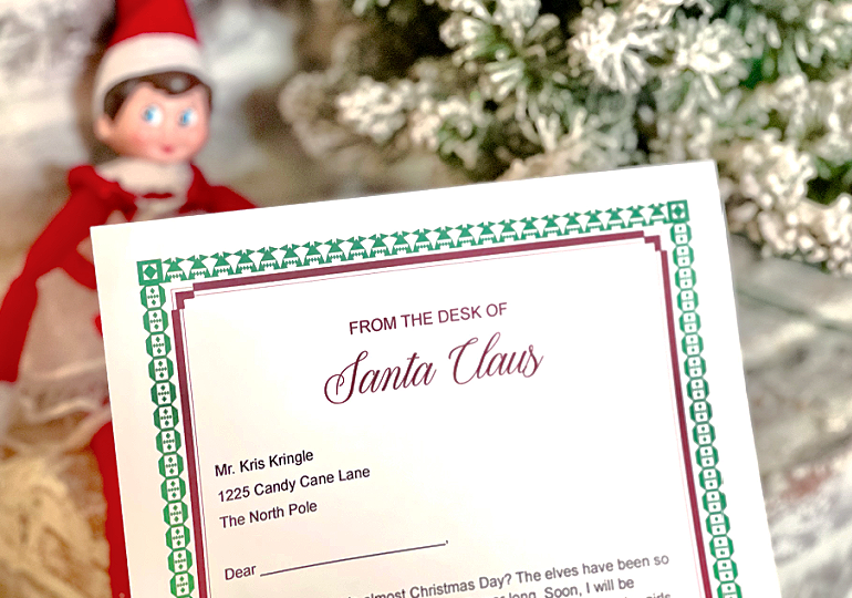 elf on shelf sitting by santa letter