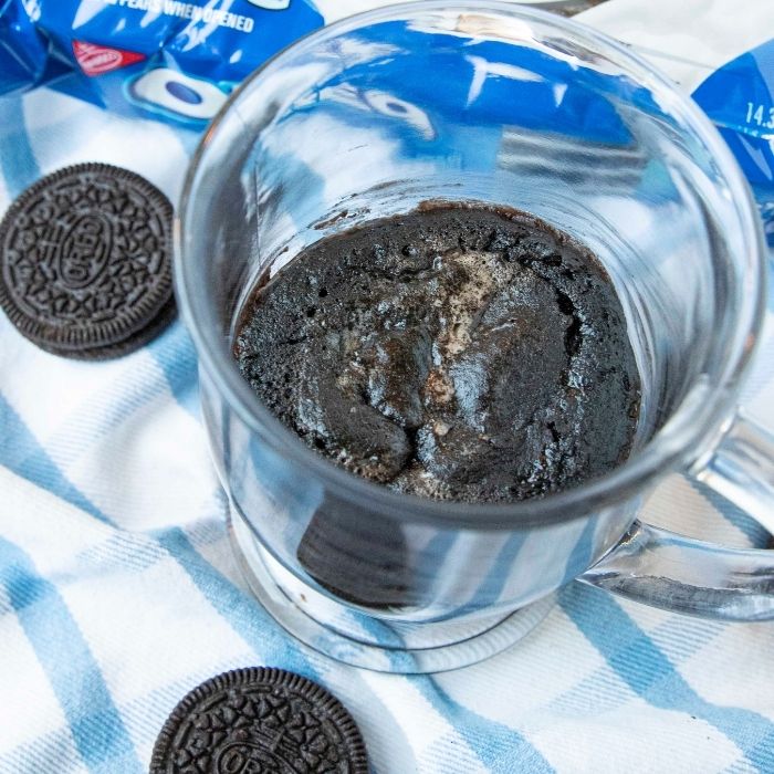overhead mug cake with oreos around it 