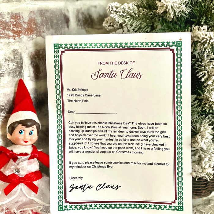 elf on shelf sitting by santa letter