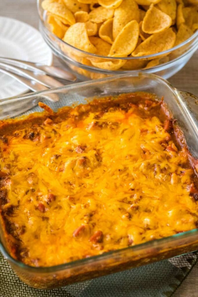 chili cheese dip in a casserole dish 