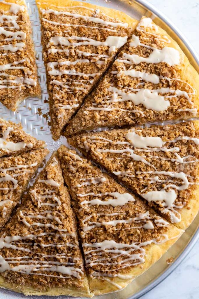 cinnamon dessert pizza in cookie tray 