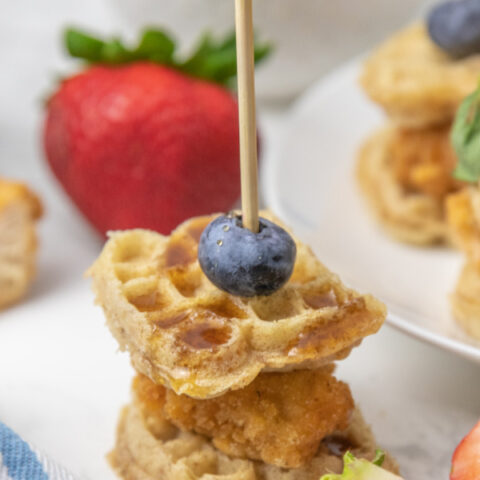 chicken and waffle with toothpick in it
