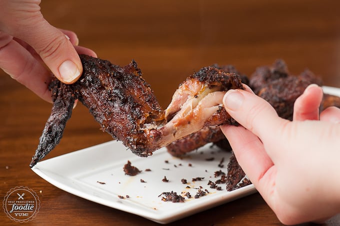 pulling a wing apart 