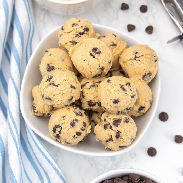 Keto cookie dough fat bombs is a great way to fuel your body and enjoy a sweet treat to break up the day. Simple ingredients is all it takes. #passion4savings #keto #cookiedough #fatbomb #ketorecipe #easy #best #homemade #fromscratch fat bombs in a bowl