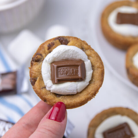 holding a mini cookie cups