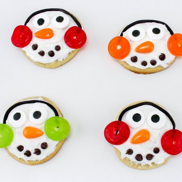 snowman cookies on white table 