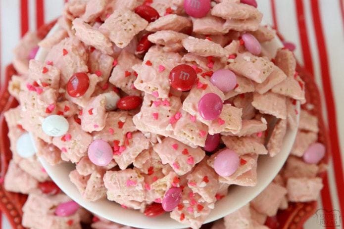 strawberry chex mix in white bowl 