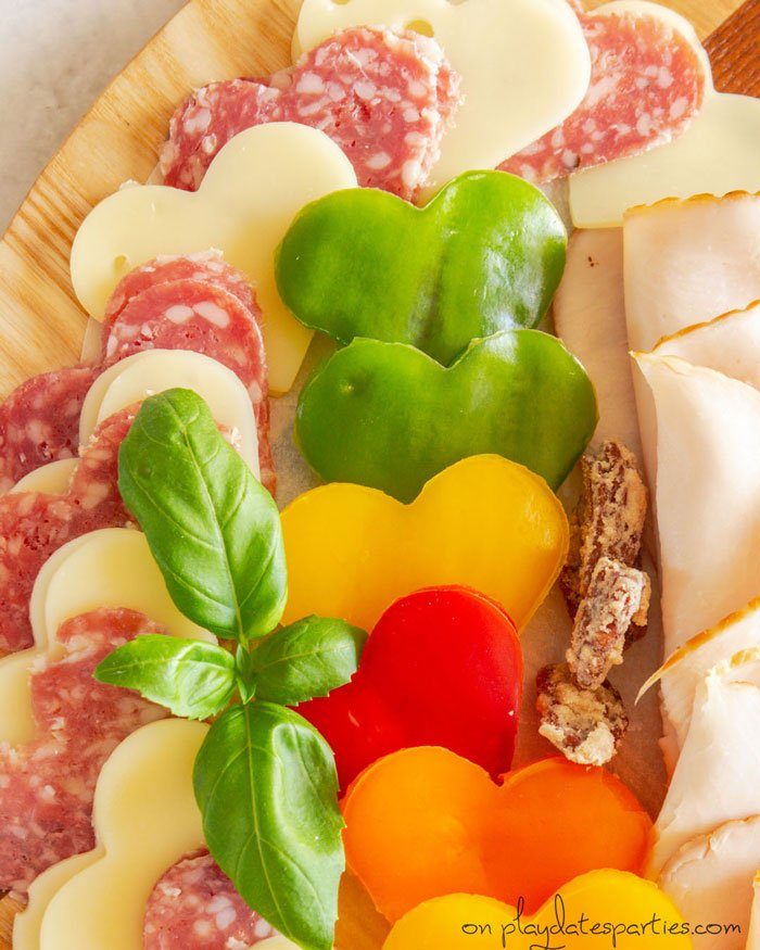 charcuterie with heart shaped food 