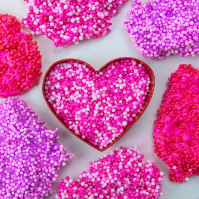 Valentine Floam is a fun and festive floam that is perfect for Valentine's Day. This is a floam hack that is a game changer! See how to make! #passion4savings #floam #diy #easy #activity #valentinesday #vday #kids #forkids heart floam on counter