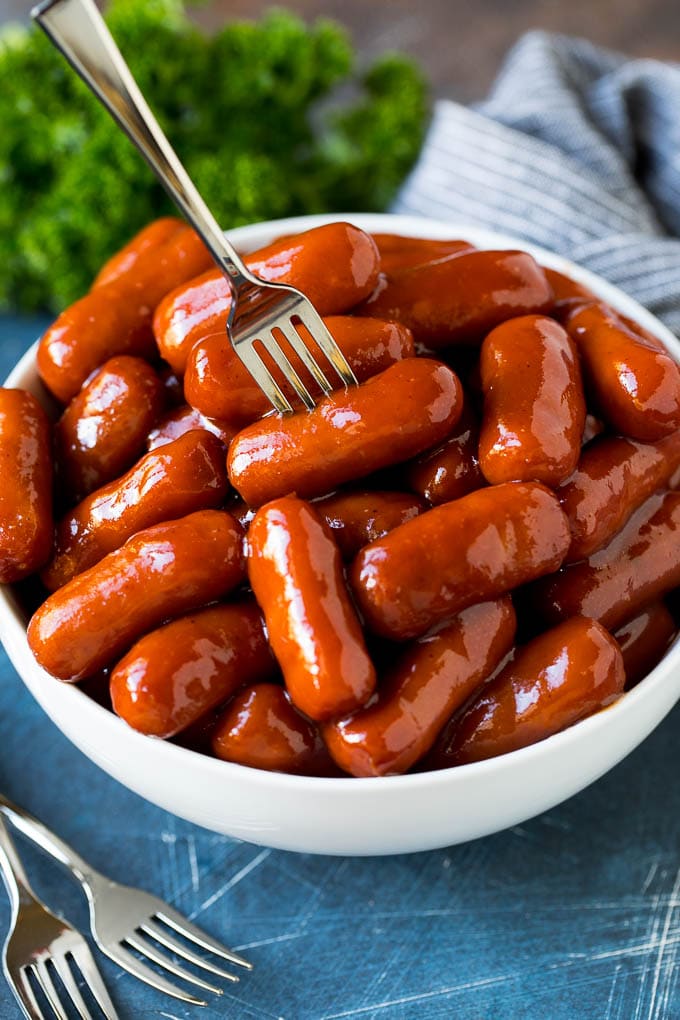 little smokies in a bowl with fork 