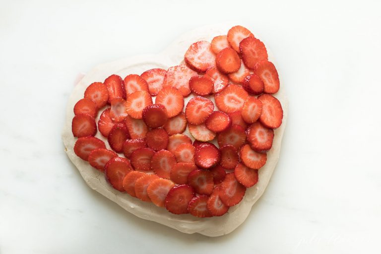 strawberry topped heart shaped meringue 