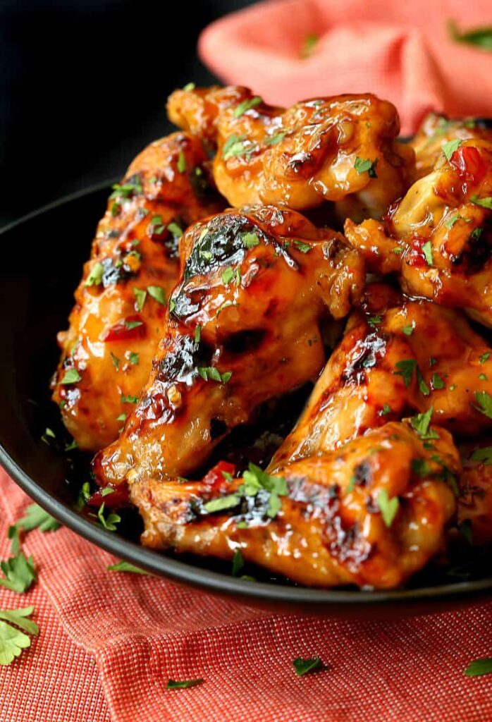 sweet chili chicken wings in a platter
