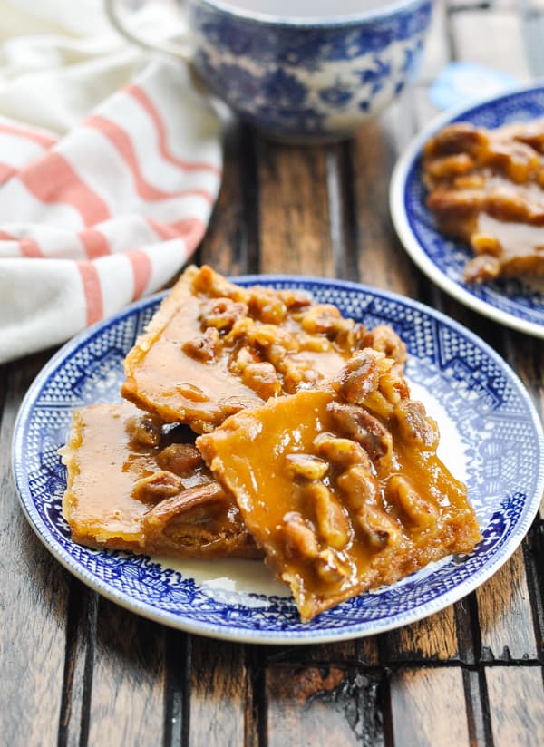 toffee bars on a blue plate 