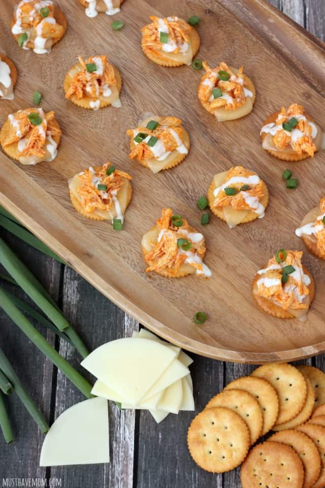 buffalo chicken topped crackers finger food platter 