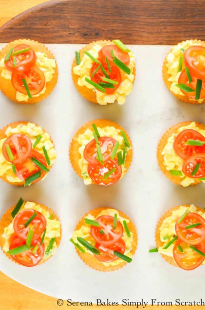 egg salad on a tray cracker appetizers 