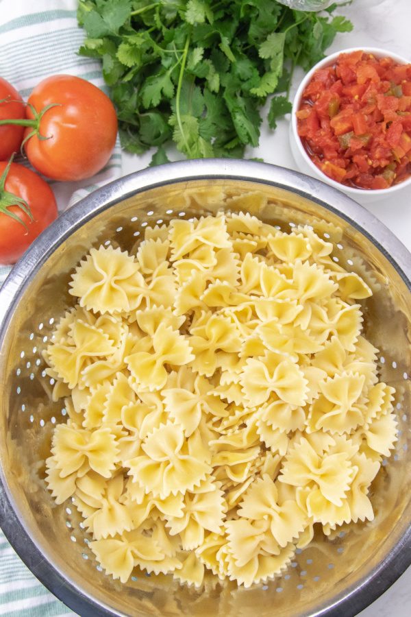 bowtie pasta in a strainer