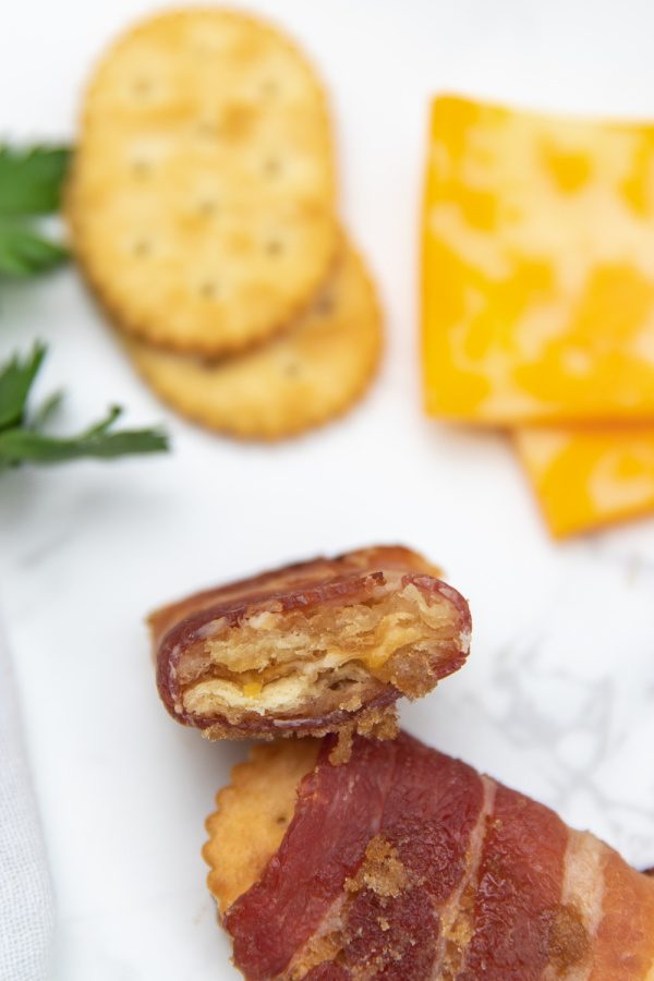 cracker wrapped in bacon on counter 