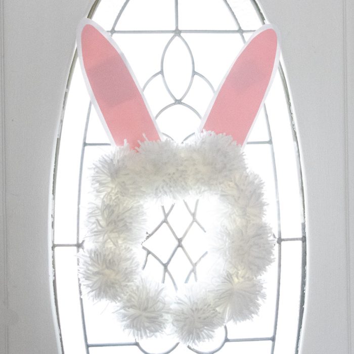 Easter bunny wreath hanging on door 
