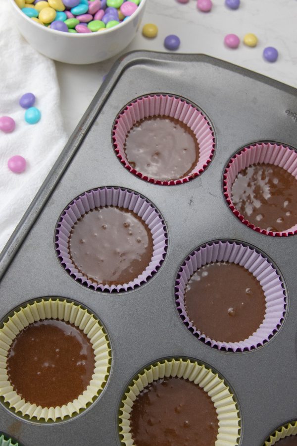 brownie batter overhead shot in muffin tin 