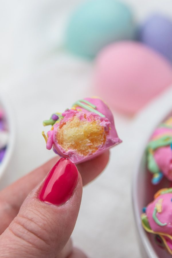 bite taken out of candy coated puff corn