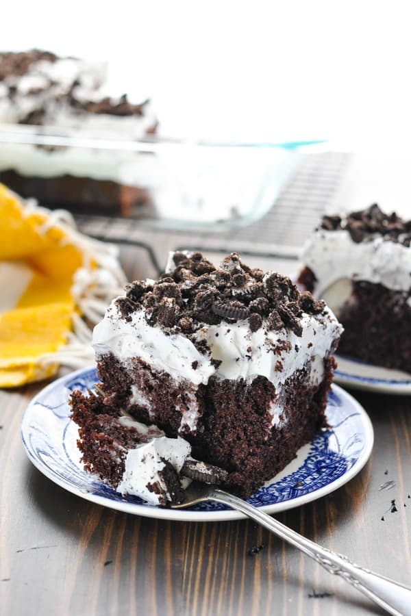 oreo pudding cake sliced on plate 