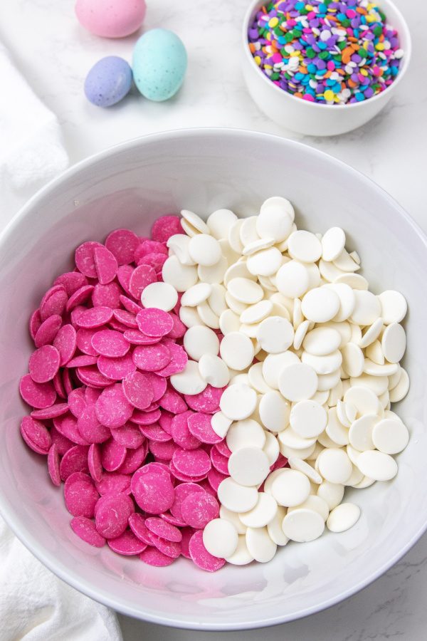 pink and white candy melts in bowl 