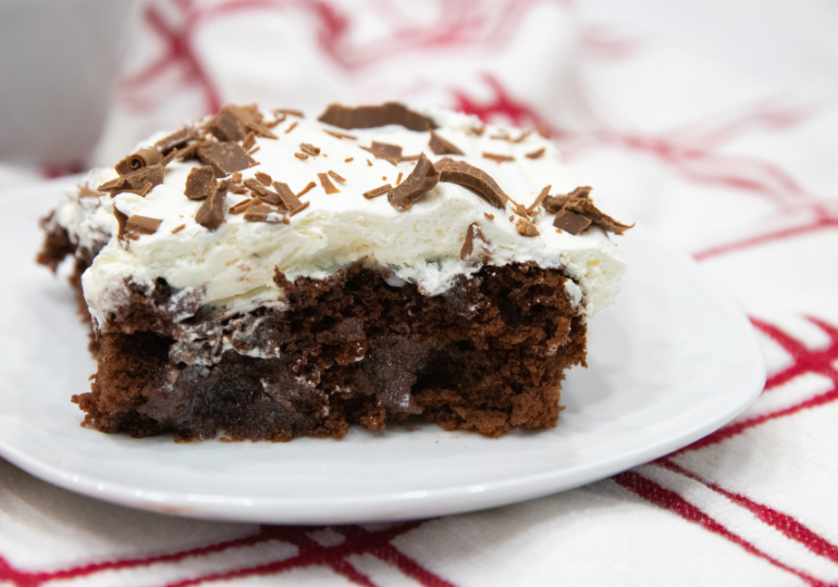 dr pepper poke cake on a plate 