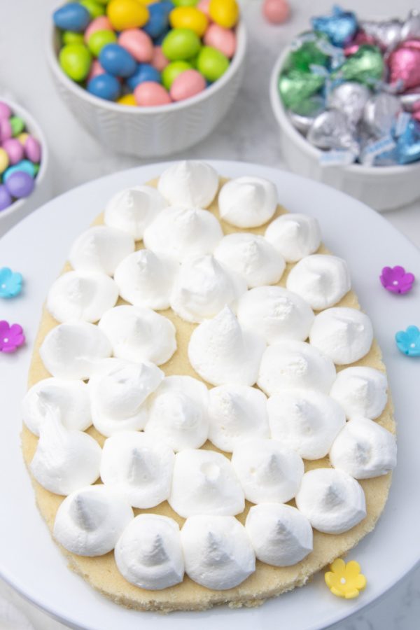 whipped cream dollops on top of sugar cookie dessert