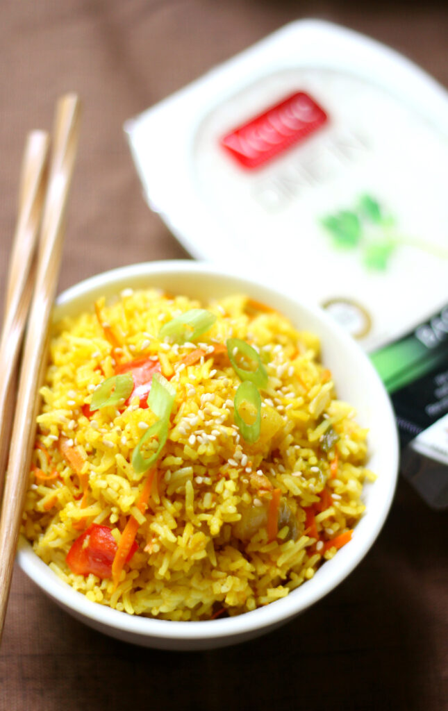 Check out these pineapple recipes for summer! Grab your favorite tropical fruit and whip up these easy dinners and desserts. #passion4savings #pineapple #recipes #desserts #dinner #easy #best #summer #recipeideas fried rice with pineapple in bowl