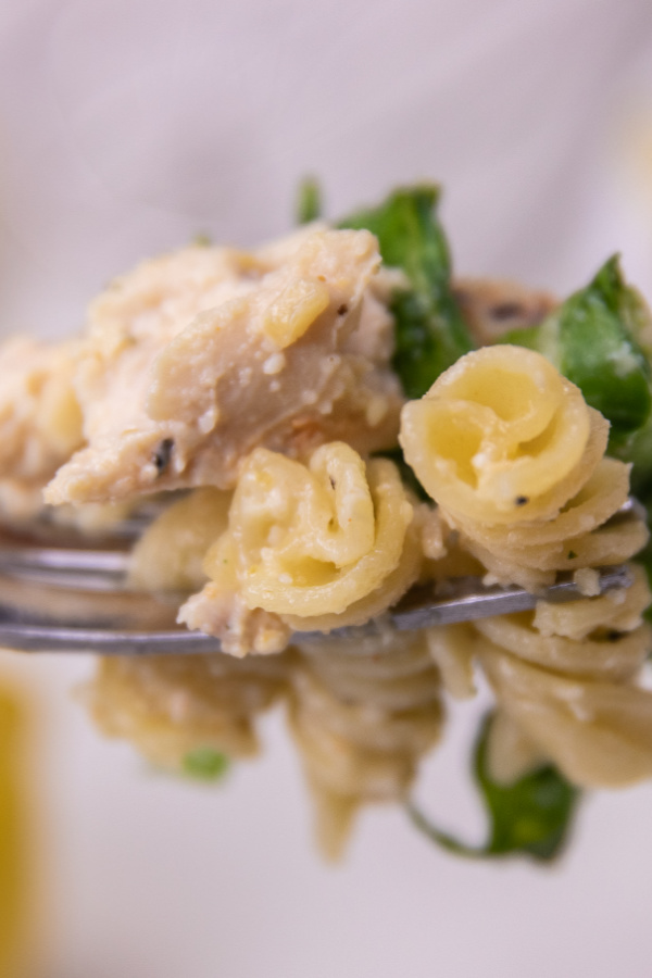 chicken caesar salad on fork 