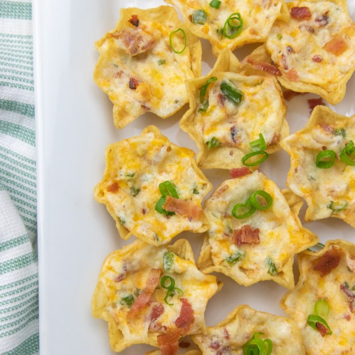 tortilla chip appetizer on white tray