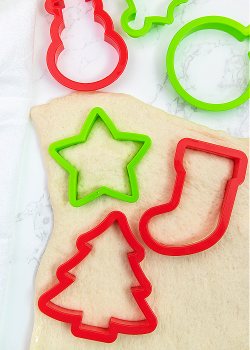 pizza dough and holiday cookie cutters