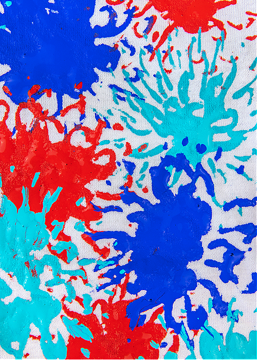 fireworks painted tshirt close up of red blue and aqua hand painted fireworks