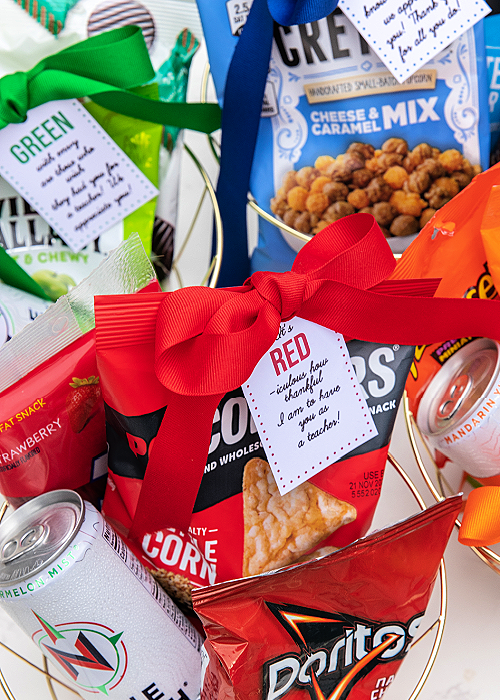 three gift baskets with green red and blue gifts in them for teachers and free printable tags