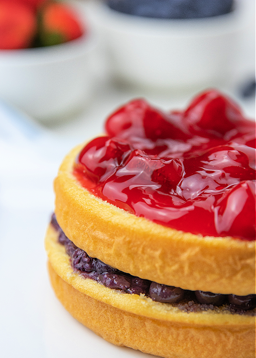 unfrosted patriotic berry cake with blueberry and strawberry filling