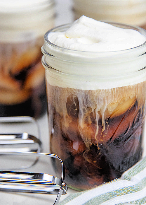 This Starbucks Sweet Cream Cold Foam Copycat recipe has the texture and flavor of the real thing! A hint of sweetness and SO refreshing! starbucks copycat sweet cream cold foam in a glass mason jar