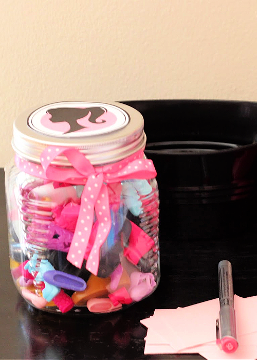We've pulled together the BEST of Barbie Party Ideas for all occasions! From backdrops to desserts, the CUTEST ideas for your inspiration! barbie jar guessing game