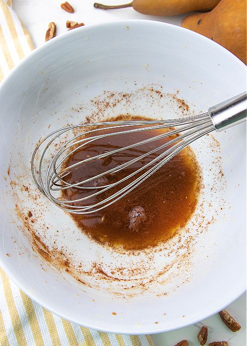 maple citrus cinnamon dressing being made for fall fruit salad