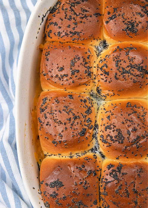 buffalo chicken sliders in a baking pan