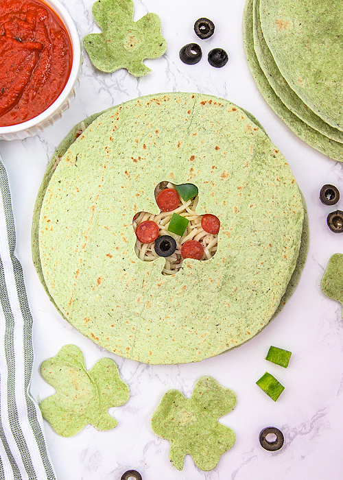 green quesadilla with a shamrock shape cut out