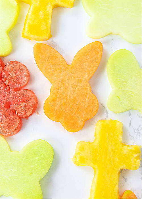fruit cut out with cookie cutters in easter shapes