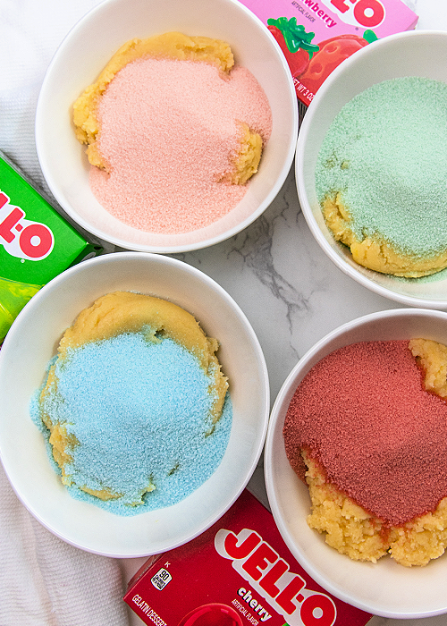 jello powder and cookie dough in small white ingredient bowls
