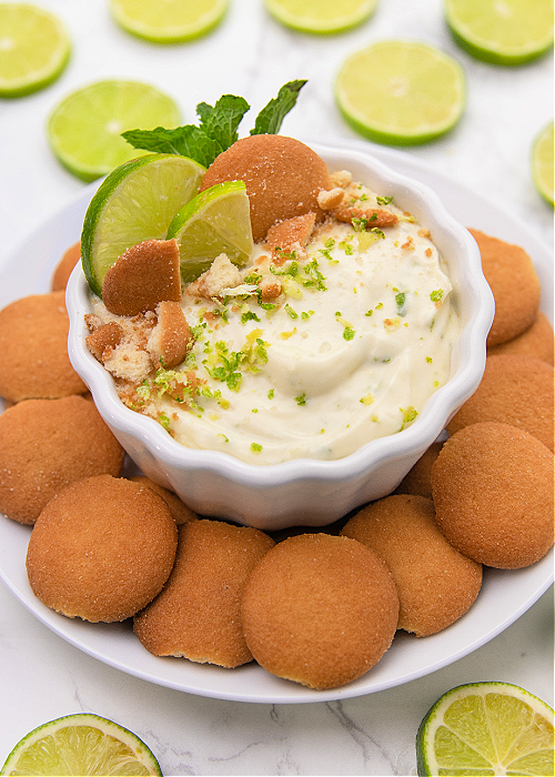 key lime pie dip in a white serving bowl